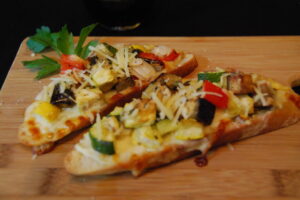 Rustic Vegetable Crostini with Melted Provolone Cheese